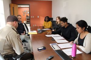 Torstenson Scholars Marka Wreh, Lillia Miller, Jordan Peoples, and Jessica Mendoza interview law enforcement personnel about how potential impacts of the oil boom on crime levels in northwestern North Dakota.